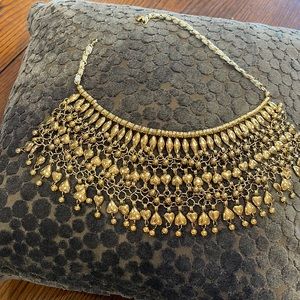 Aurelie Bidermann gold egyptian looking bexnlace hanging heart